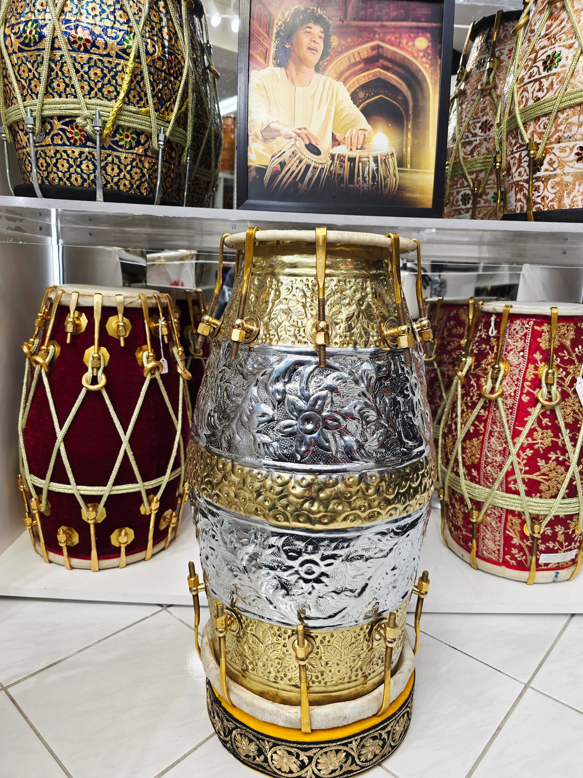 Udhyam's Package: SvarNāratna – The Encarved 15.6 LBS Copper Crown Dholak + Transparent Ghattas + Dholak Bags + Masala - Sangeet Store