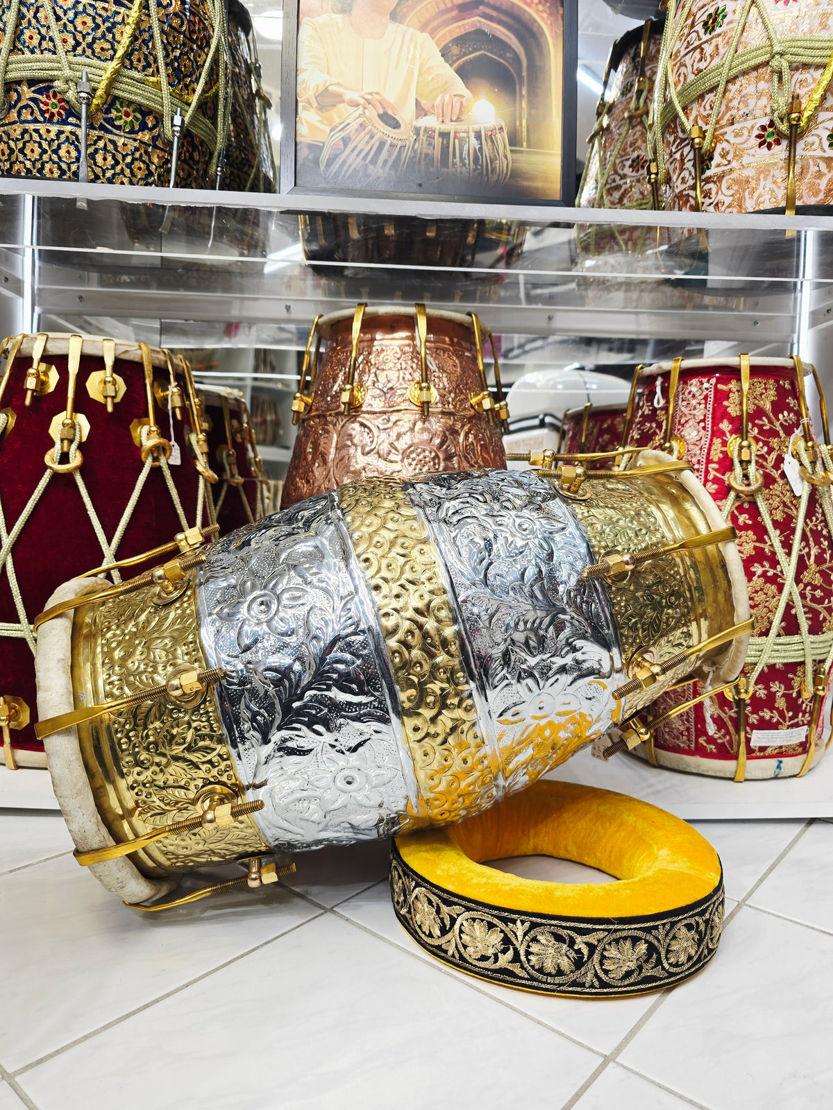 Udhyam's Package: SvarNāratna – The Encarved 15.6 LBS Copper Crown Dholak + Transparent Ghattas + Dholak Bags + Masala - Sangeet Store