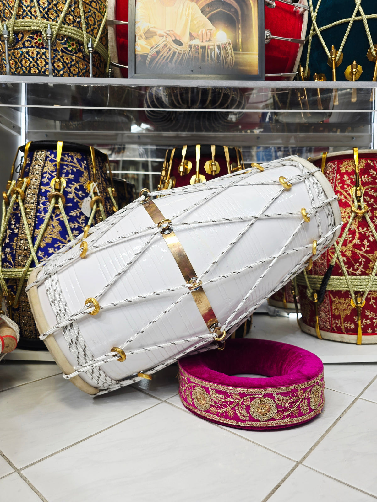 Ivory Current – West Indian Dholak
22.5″ Length | 14.4 lbs Red Sheesham | Exceptional Tone • Minor Cosmetic Blemishes