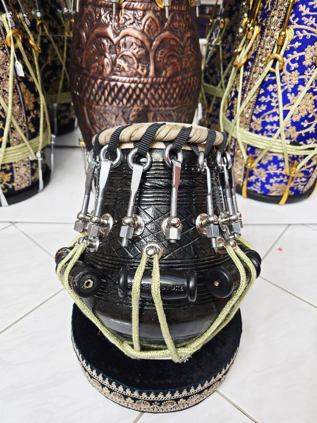 Nirvakal — 5.5″ Dark Engraved Mahogany Bolted Dayan (E / F · Exceptional Tone)