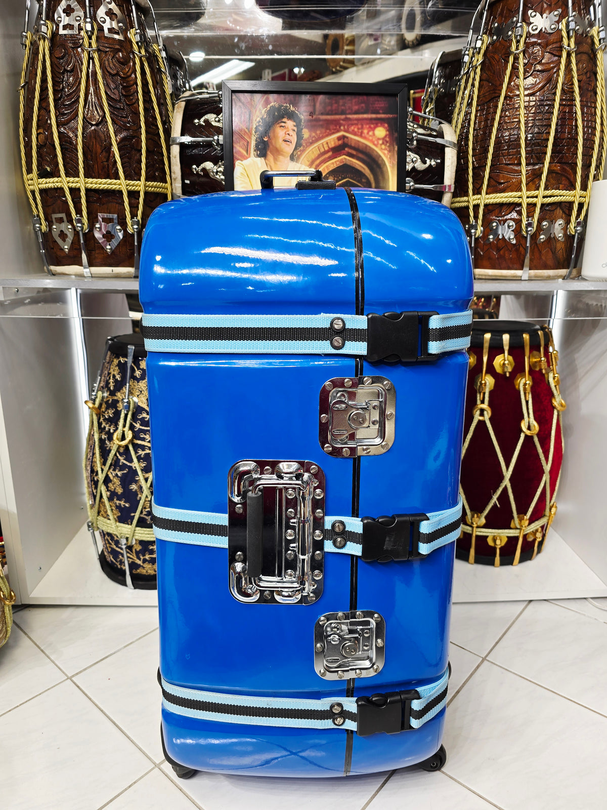 Azura Drift — Glossy Blue Tabla Travel Case · 360° Spinner Wheels · Dual Handles · Fixed Reinforcement Bands · Minor Cosmetic Blemishes (g)
