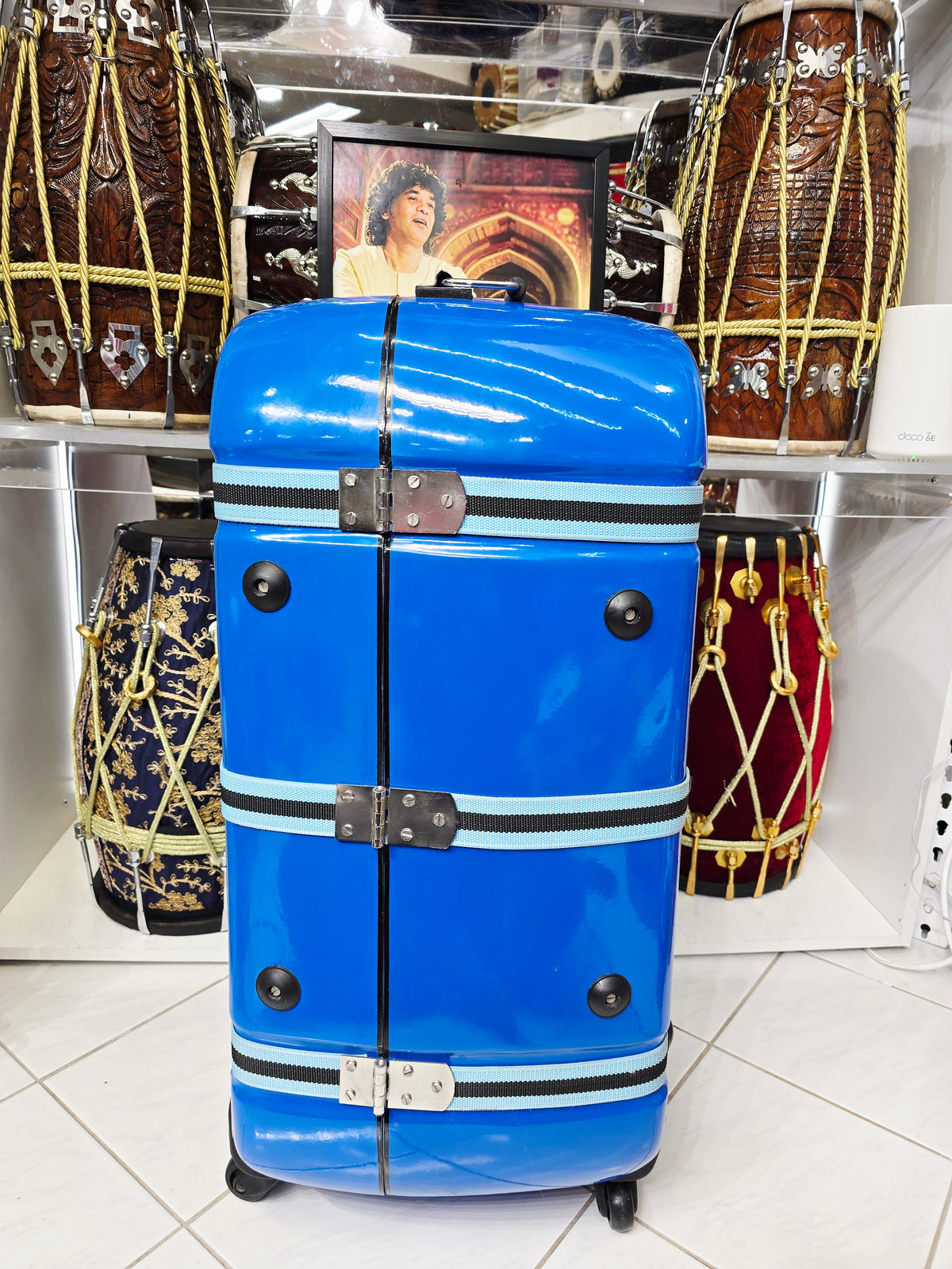 Azura Drift — Glossy Blue Tabla Travel Case · 360° Spinner Wheels · Dual Handles · Fixed Reinforcement Bands · Minor Cosmetic Blemishes (g)