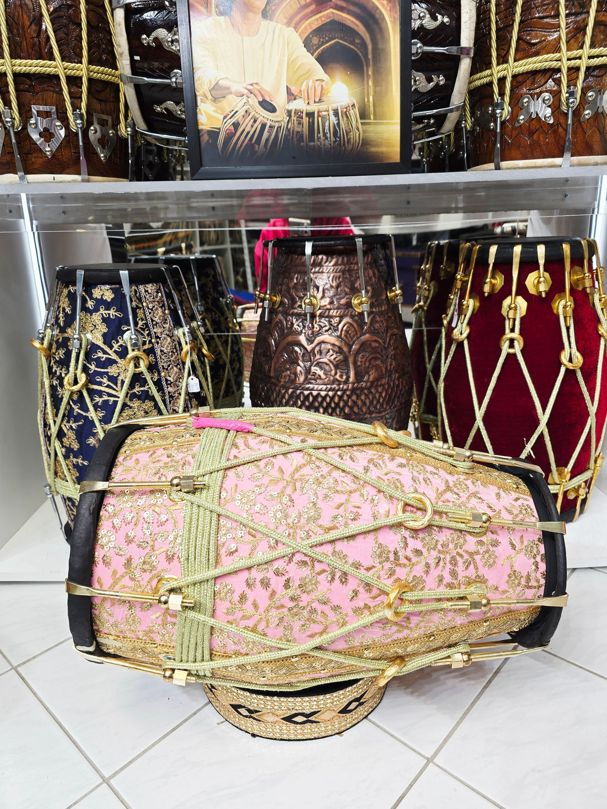 Gulzar Rosé — Pink Sherwani-Wrapped Red Sheesham Dholak · Black Skins · Gold Roping