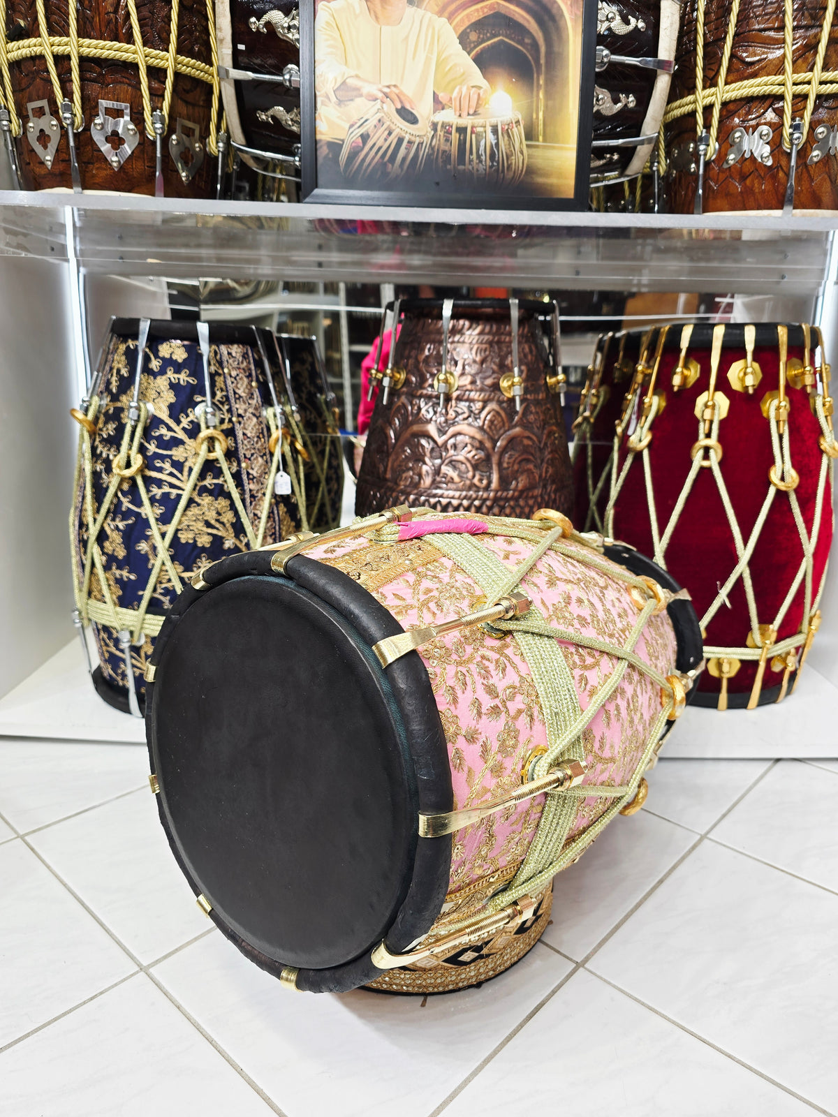 Gulzar Rosé — Pink Sherwani-Wrapped Red Sheesham Dholak · Black Skins · Gold Roping