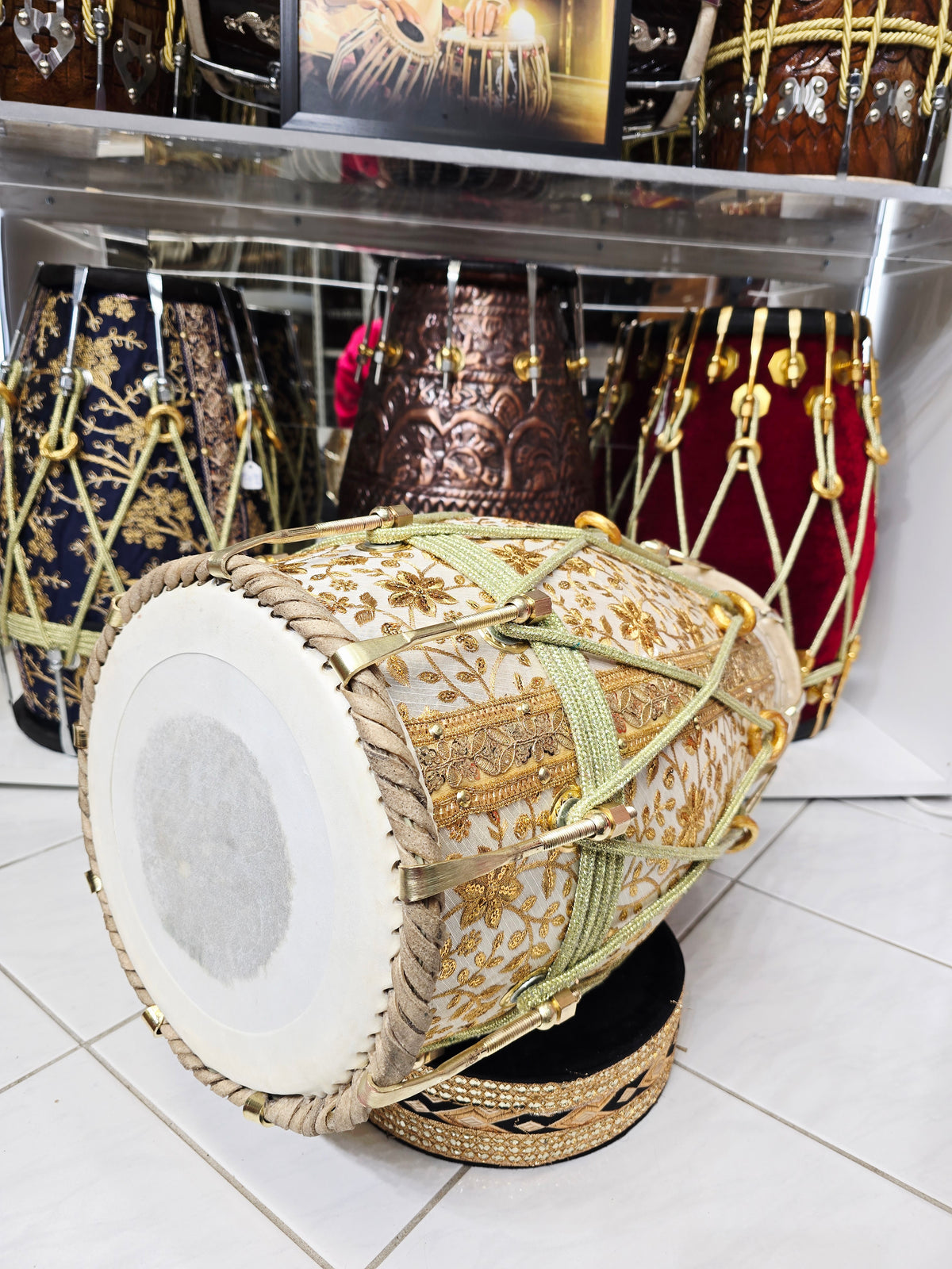 Aurelian Noor — Gold & White Sherwani-Wrapped Red Sheesham Dholak · Gold Roping *Exceptional Tone + Devin's Personal Dholak*