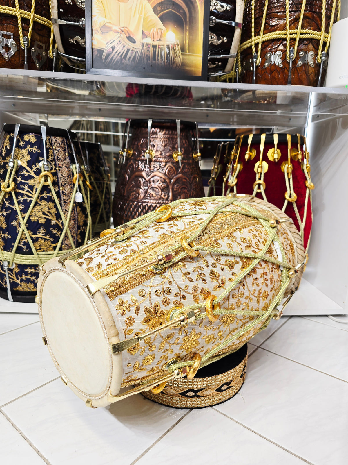 Aurelian Noor — Gold & White Sherwani-Wrapped Red Sheesham Dholak · Gold Roping *Exceptional Tone + Devin's Personal Dholak*