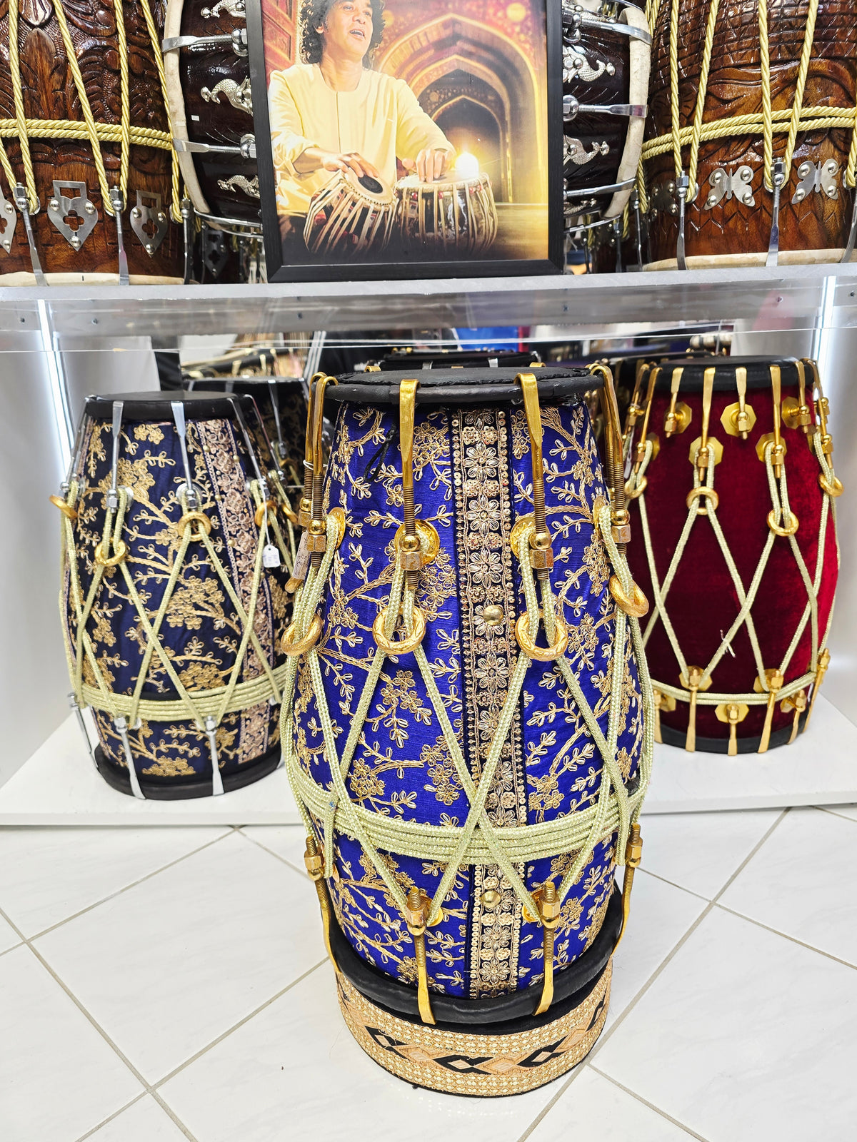 Royal Heritage: Blue and Gold Sherwani Wrapped Red Sheesham Dholak with Reverse Syaahi Thin Rimmed Skin and Black Skins *Minor Cosmetic Defects *Exceptional Tone