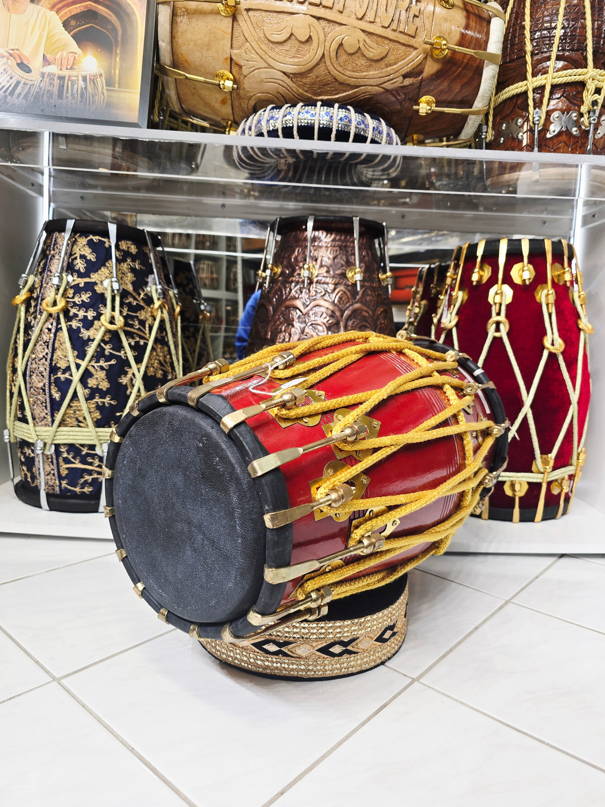 Kesari Naad™ — Double Bolted Pro Red Sheesham Dholak (Saffron Painted Finish) Minor Cosmetic Crack + Minor Chips in Brass Coated Bolt Finish *Exceptional Tone