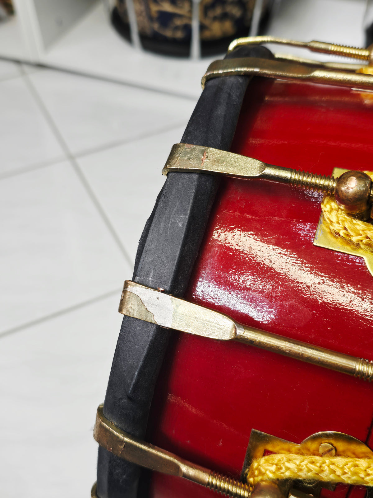 Kesari Naad™ — Double Bolted Pro Red Sheesham Dholak (Saffron Painted Finish) Minor Cosmetic Crack + Minor Chips in Brass Coated Bolt Finish *Exceptional Tone