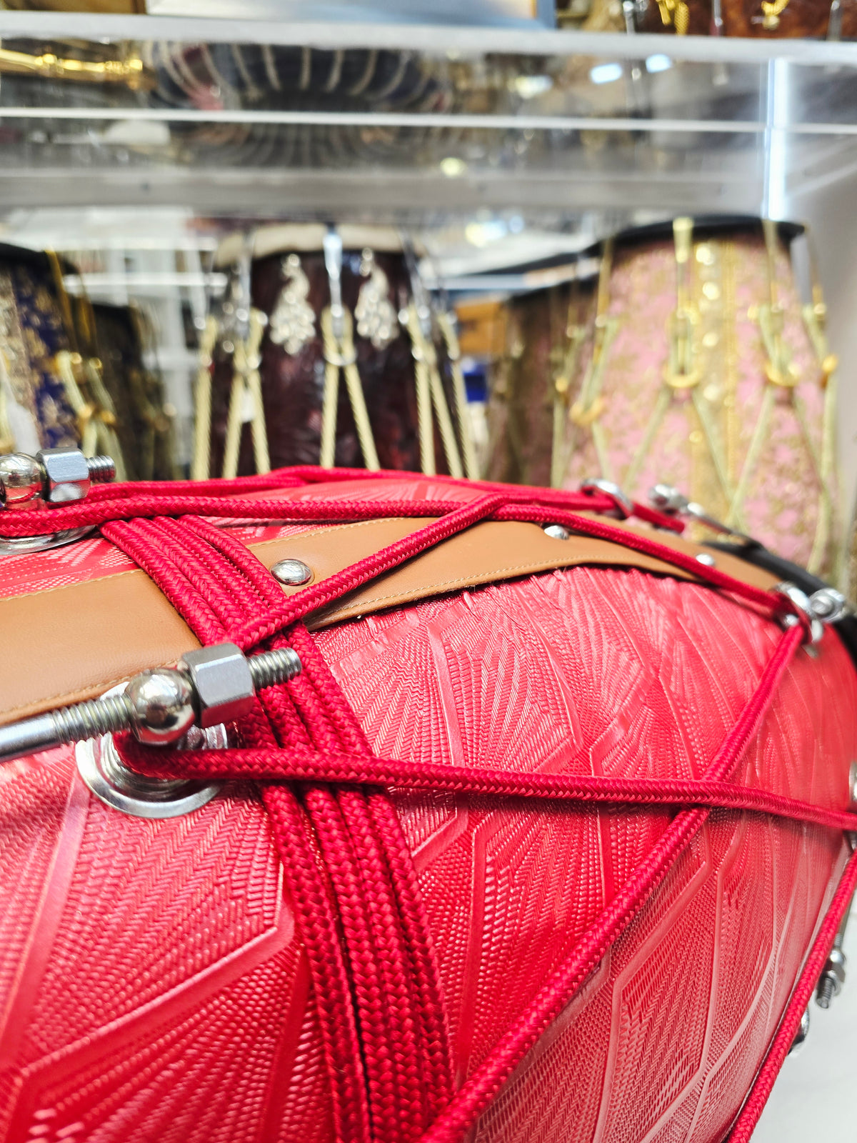 Laal Darbar – Premium Red Designer Leather Wrapped Red Sheesham Dholak | Red Cosmetic Ropes & Black Skins *Minor Cosmetic Blemish/ Tear *Exceptional Tone