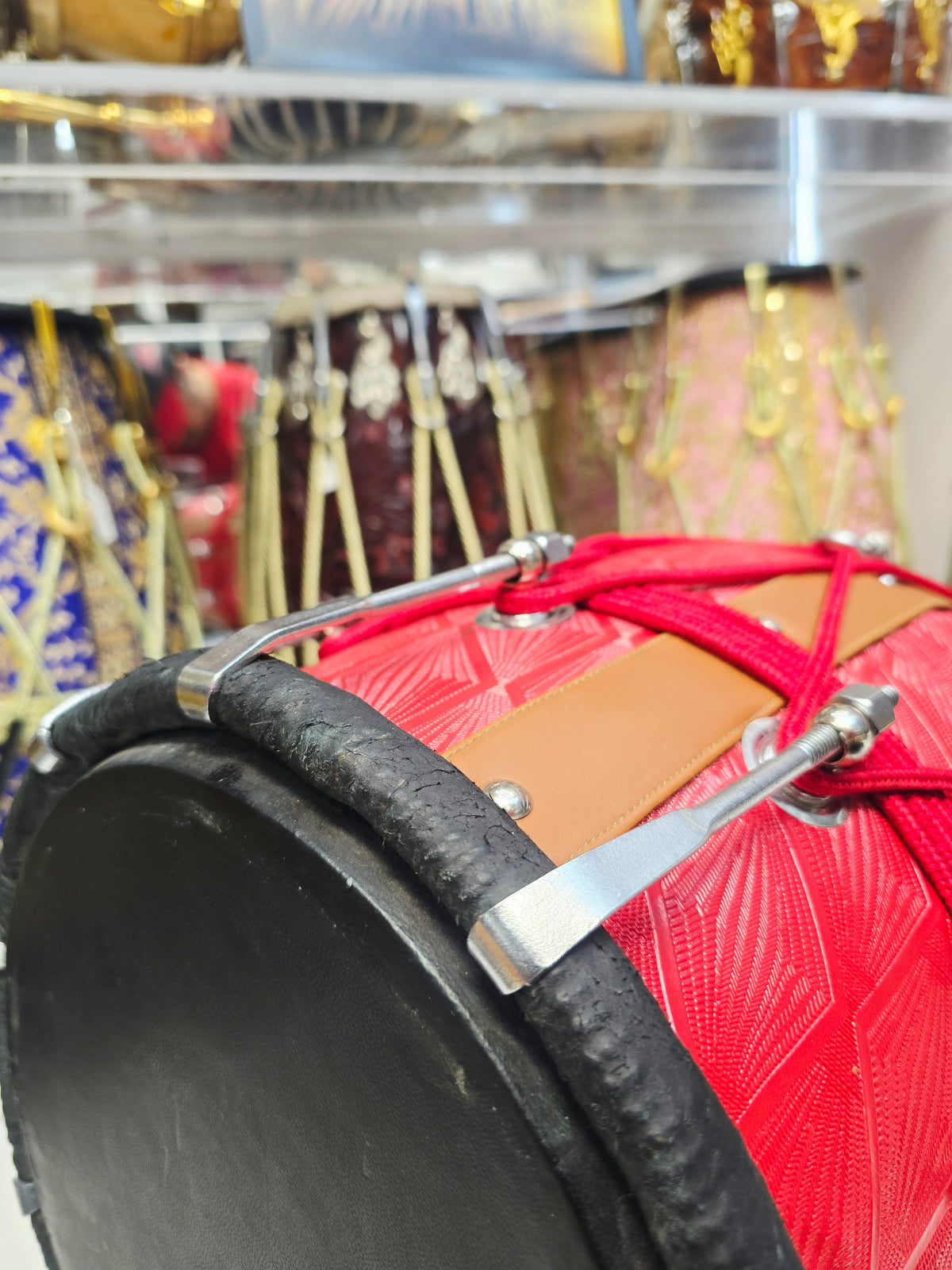 Laal Darbar – Premium Red Designer Leather Wrapped Red Sheesham Dholak | Red Cosmetic Ropes & Black Skins *Minor Cosmetic Blemish/ Tear *Exceptional Tone