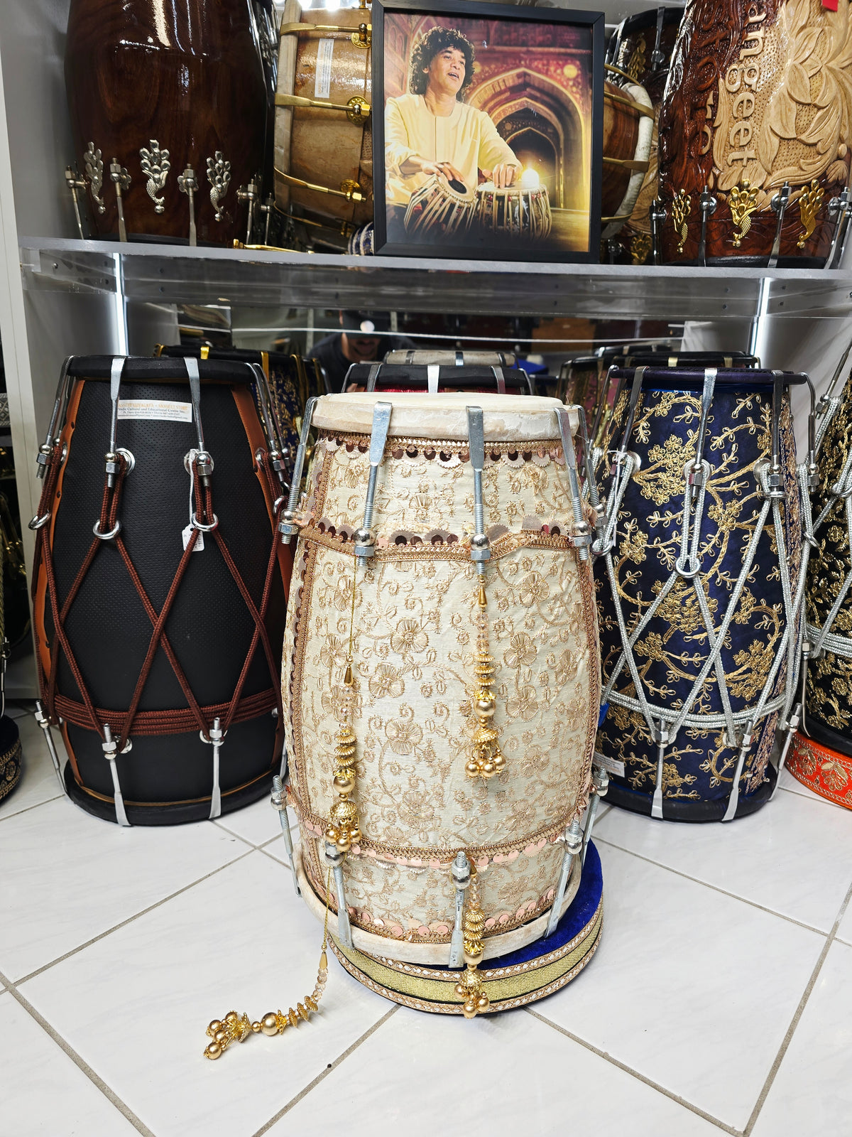 Noor-e-Mehfil – Ivory & Gold Floral Sherwani-Wrapped Designer Mehendi Night Dholak with Decorative Golden Ornaments
