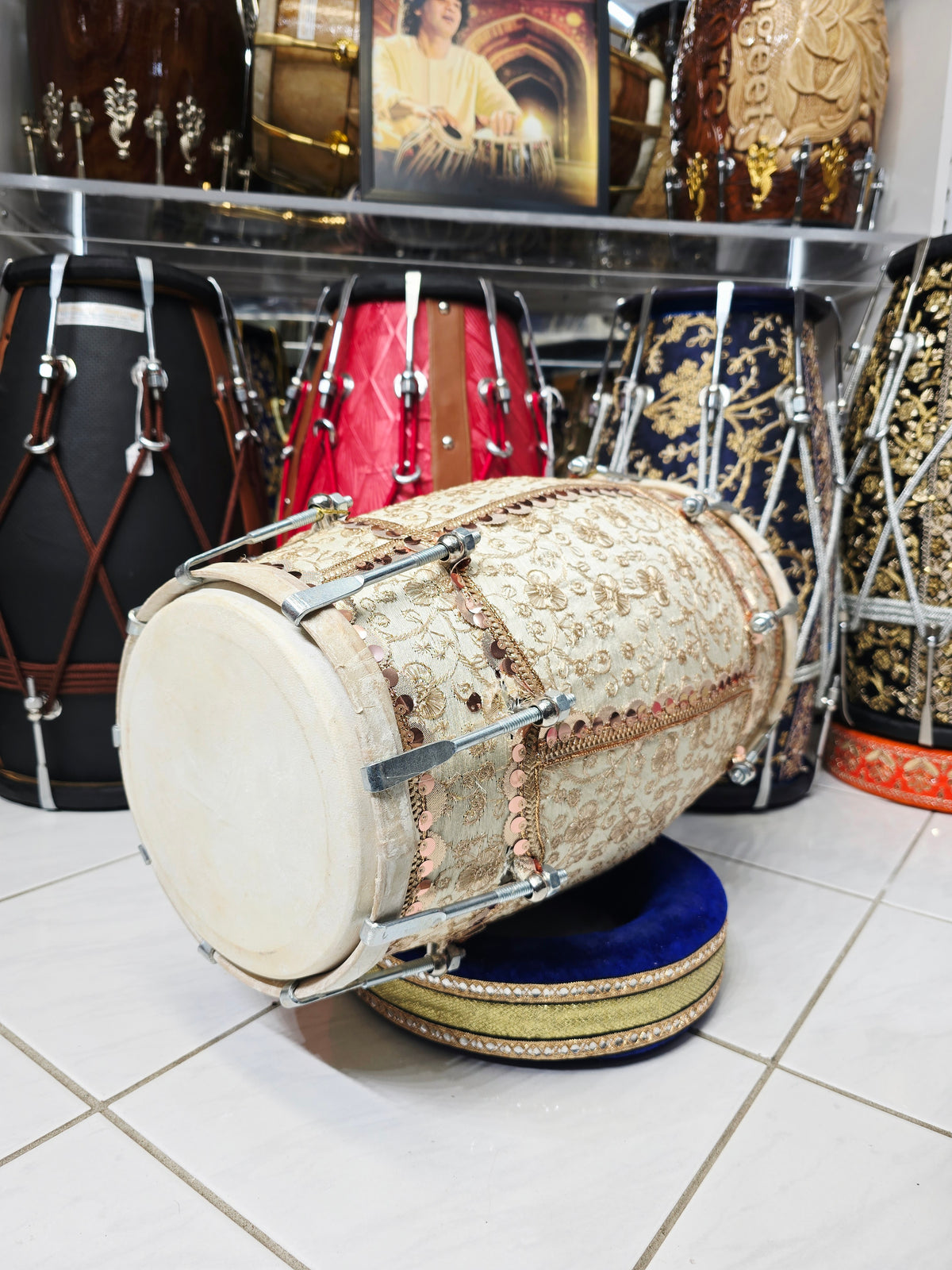 Noor-e-Mehfil – Ivory & Gold Floral Sherwani-Wrapped Designer Mehendi Night Dholak with Decorative Golden Ornaments