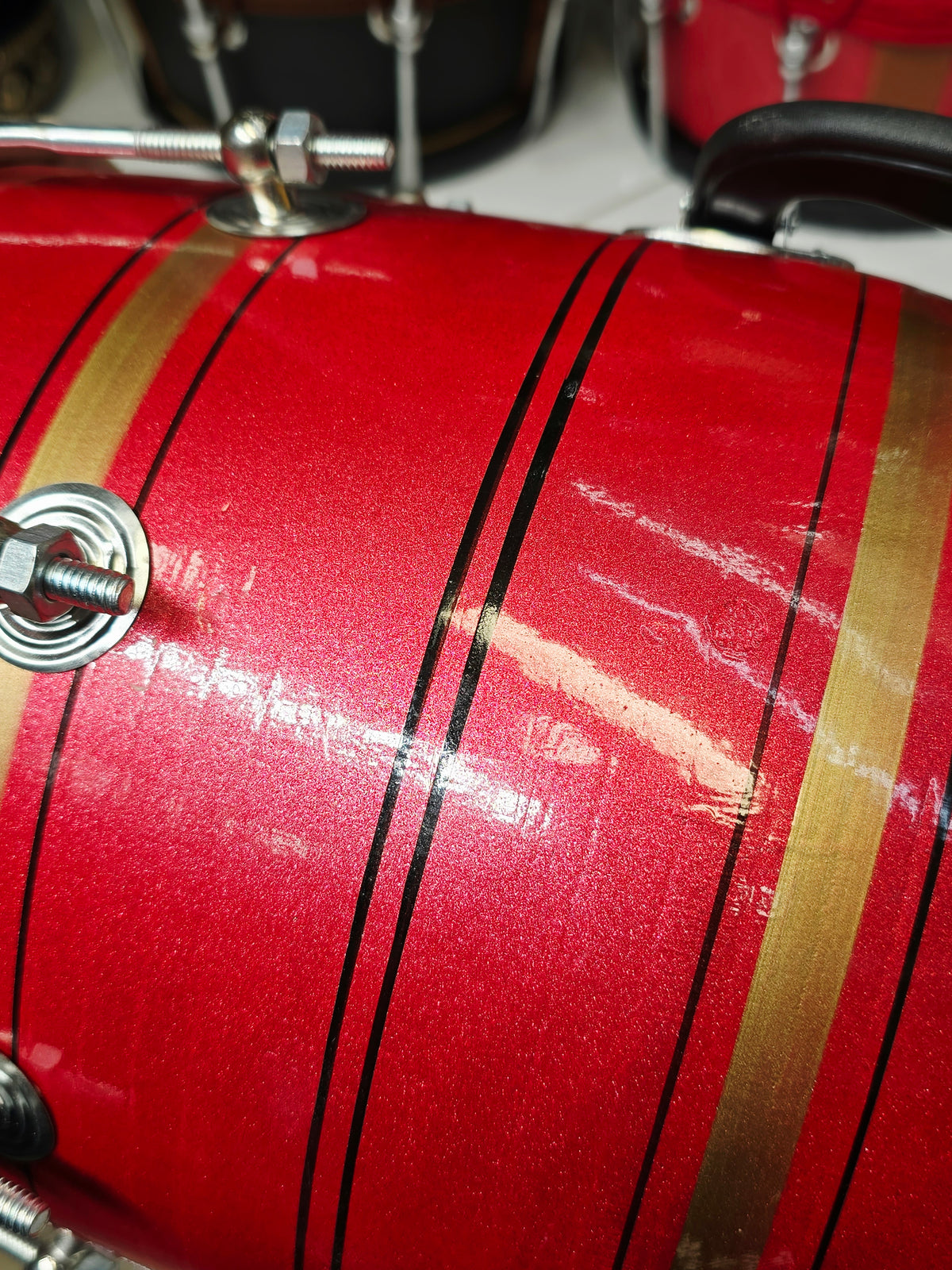 Lal Shakti – Metallic Crimson Red & Champagne Gold Striped Student Dholak with Black Pinstripes & Carrying Handle *Minor Cosmetic External Crack & Blemishes (R2)