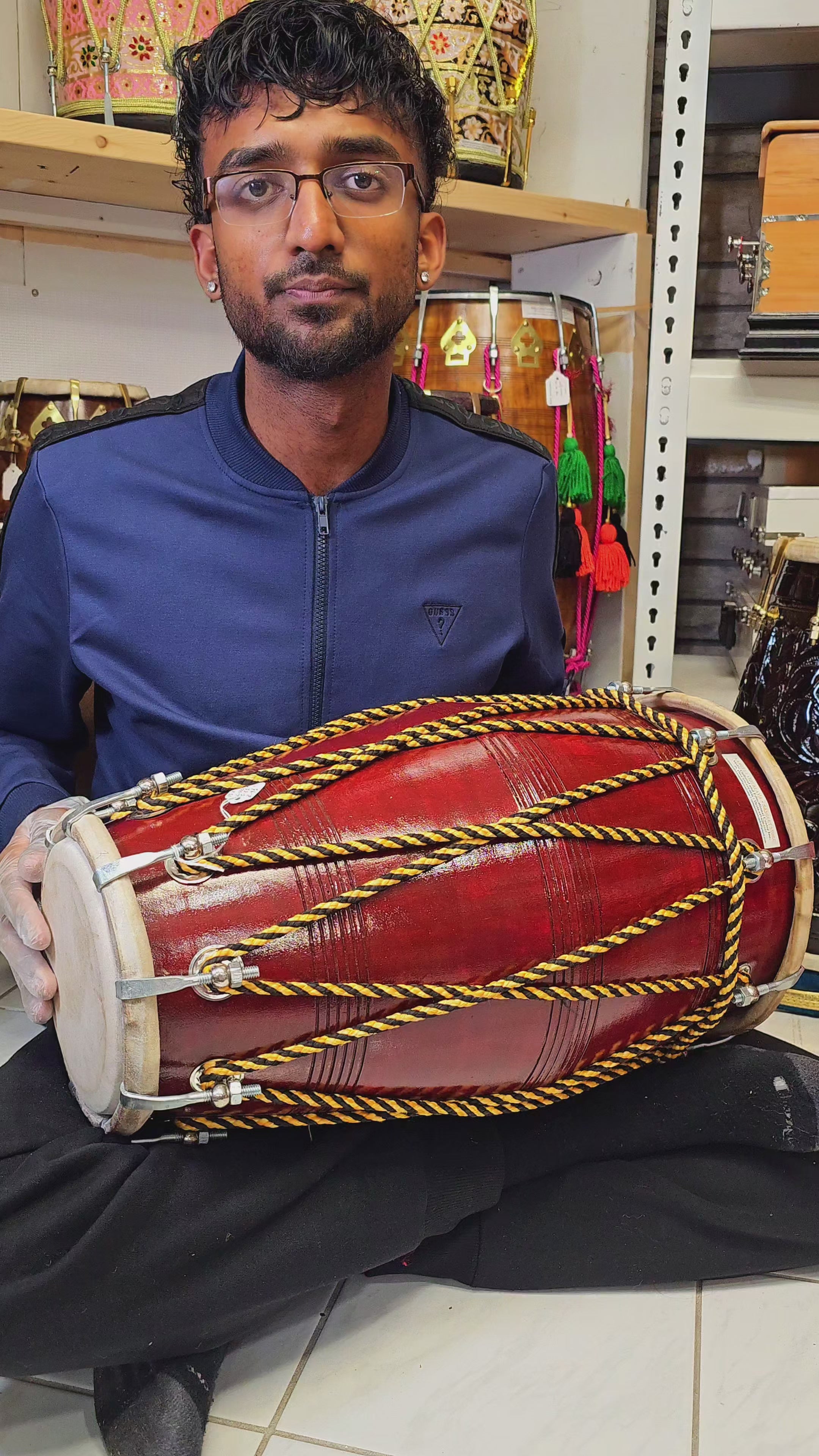 The HoneyComb Harmony Dholak - A Burgundy Professional Mango Wood Dholak with Yellow and Black Ropes, Chrome Bolts, and a Handle!