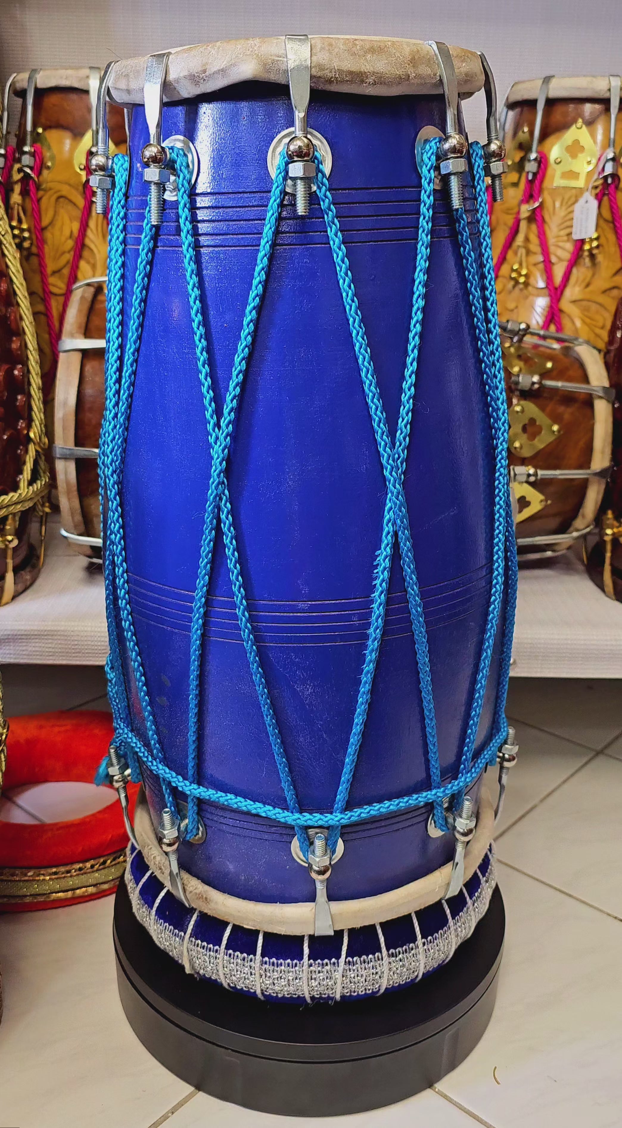 The Cobalt Crescendo Pro Dholak - A Blue Professional Dholak with Chrome Bolts and Striking Blue Ropes Design!